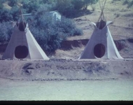 Teepees set up on the parade ground used for Order of the Arrow ceremonies, circa 1958.