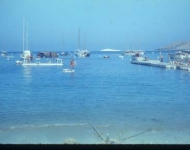 The waterfront swimming area with float and the pier which I understand is now gone.