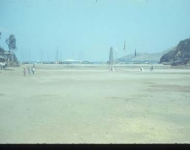 The parade ground looking toward the beach with the lighthouse in the background, circa 1958.
